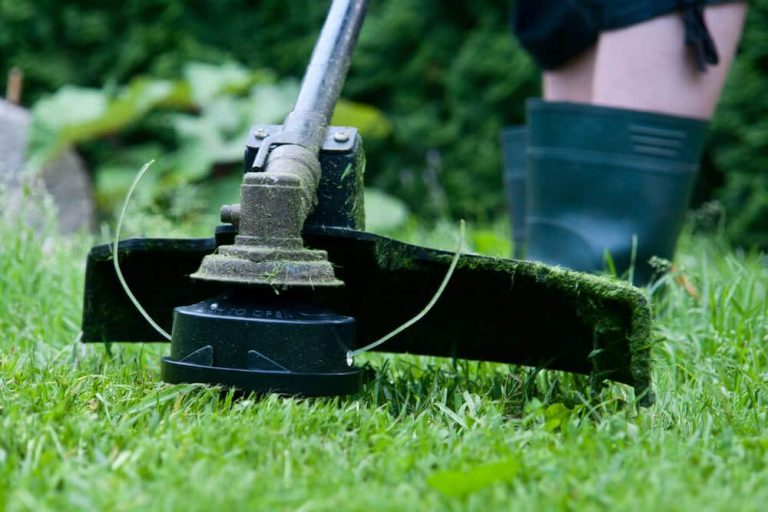 Using gas trimmer - Big Easy Fences