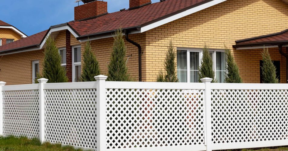 A house with white PVC fence