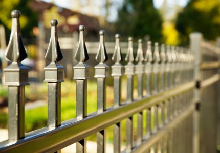 Pointed metal fence perspective with a narrow depth of field