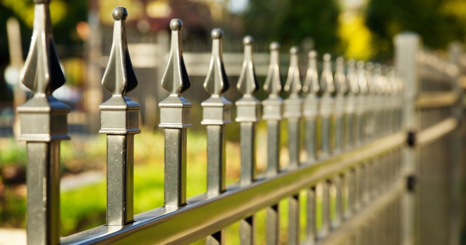 Pointed metal fence perspective with a narrow depth of field